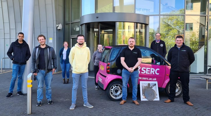 Students and staff from sawtech outside space building. 